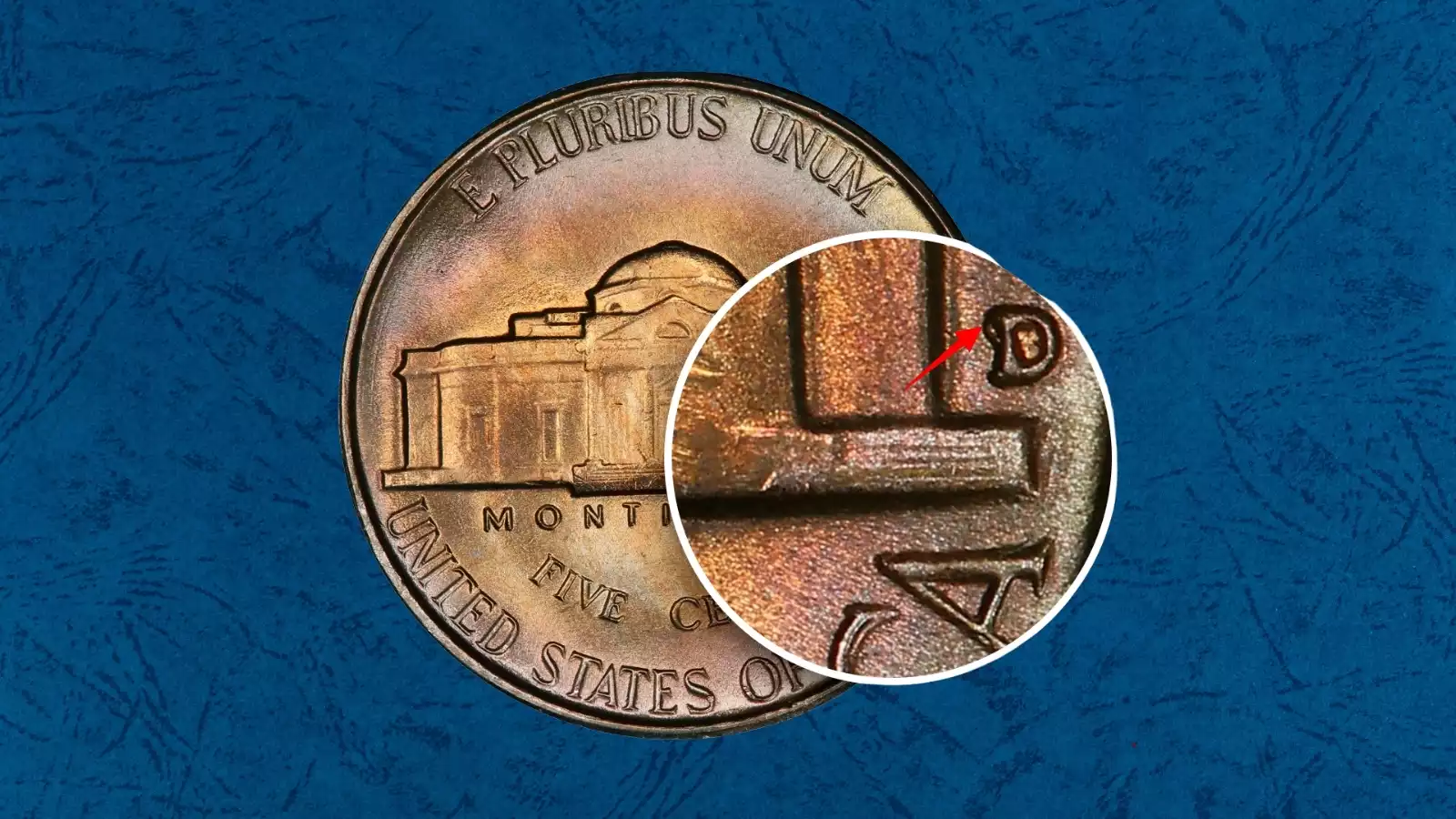 Close-up of 1949-D/S overmintmark showing curved S remnants beneath the D under magnification